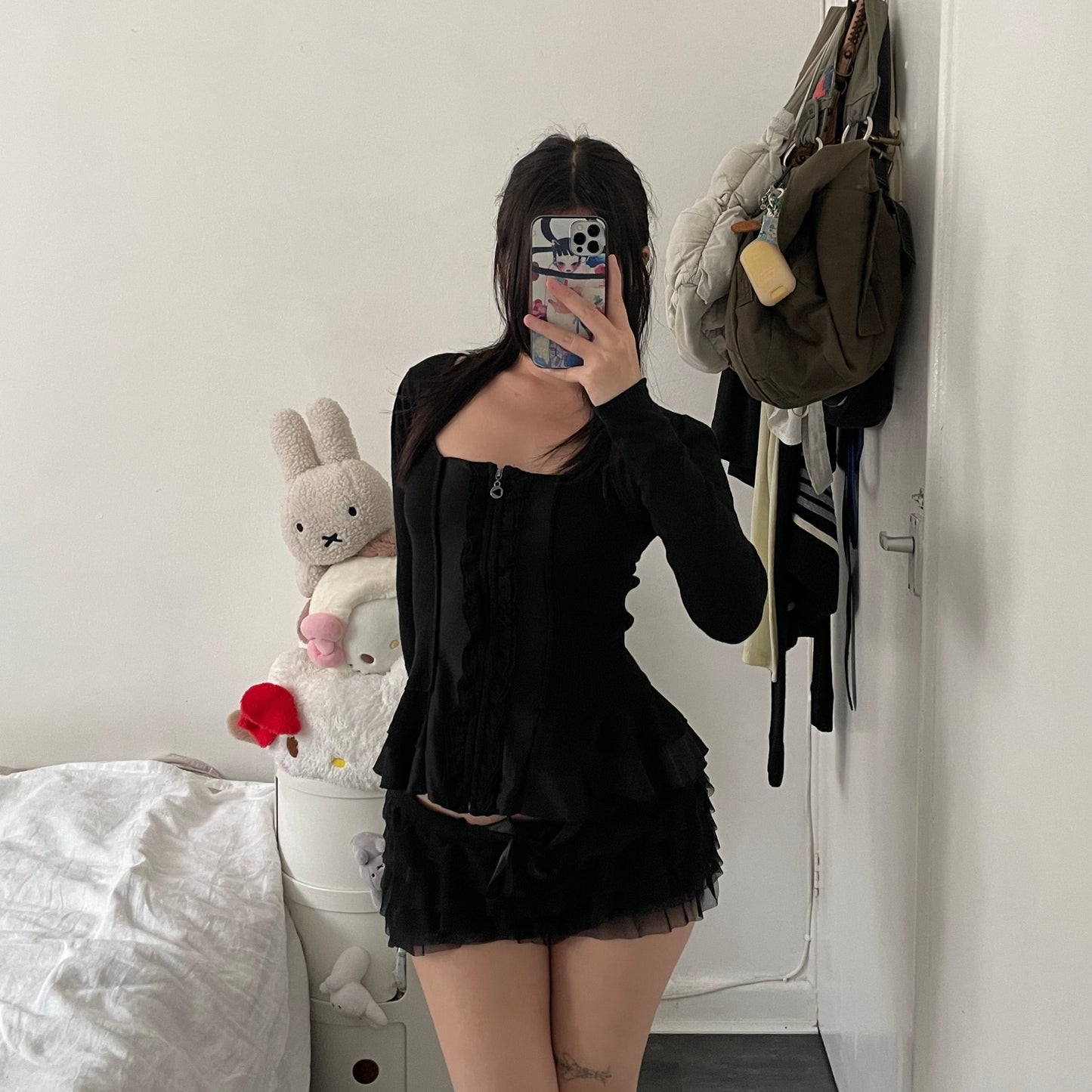 morgan de toi black frilly ruffle hem zip fitted long sleeve top