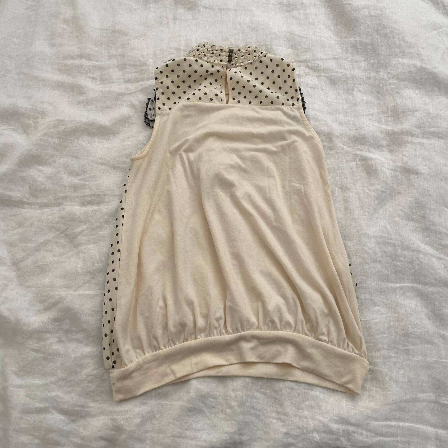 axes femmes cream polka dot ruffle collar blouson vest top