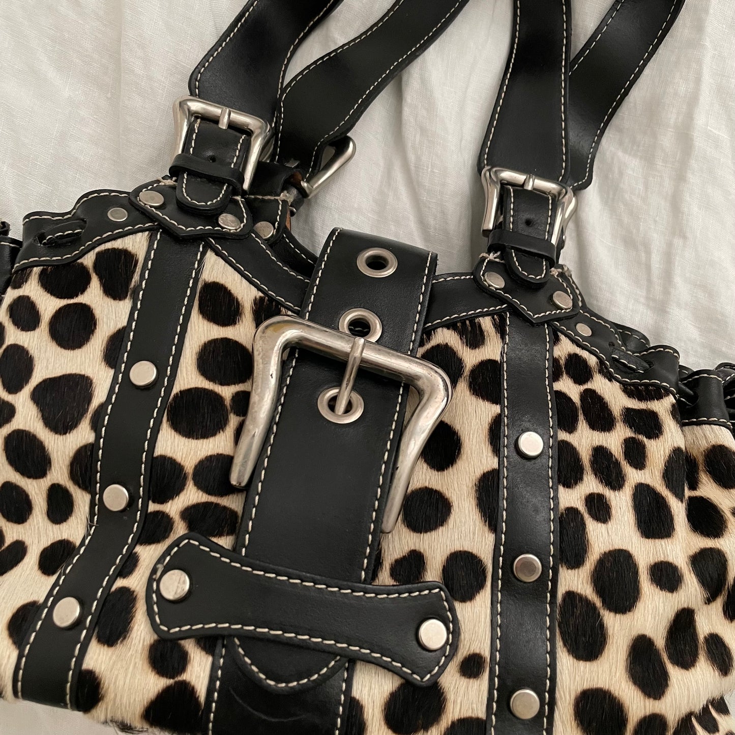 vintage gaia's leather pony hair dalmatian print shoulder bag with buckle detail