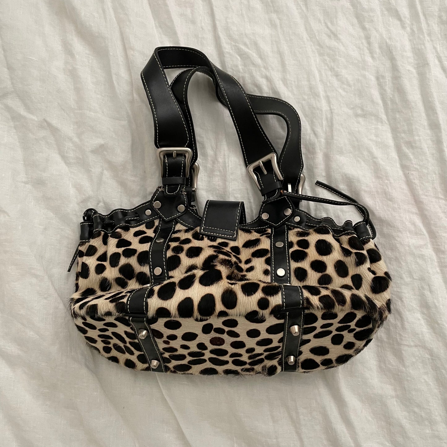 vintage gaia's leather pony hair dalmatian print shoulder bag with buckle detail
