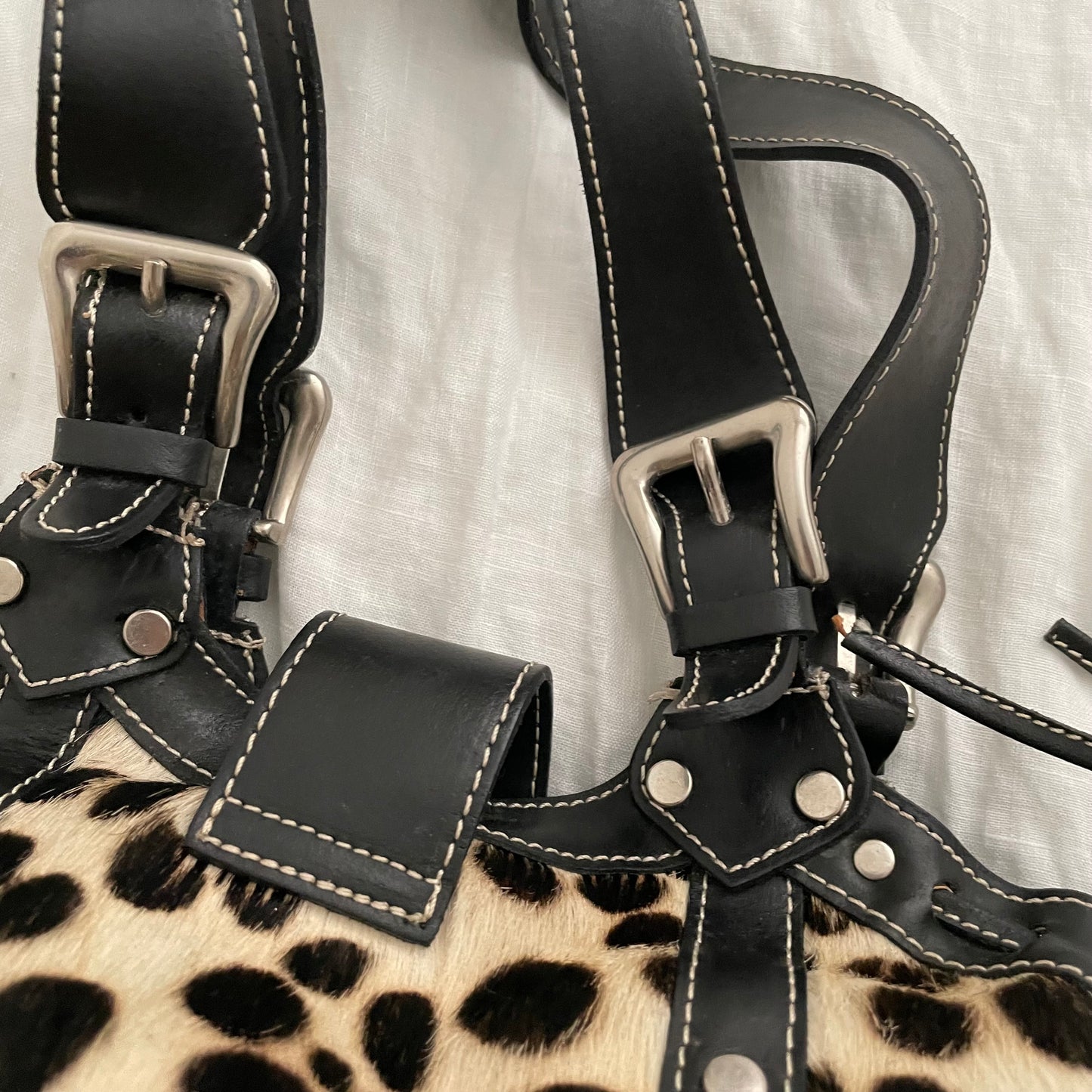 vintage gaia's leather pony hair dalmatian print shoulder bag with buckle detail