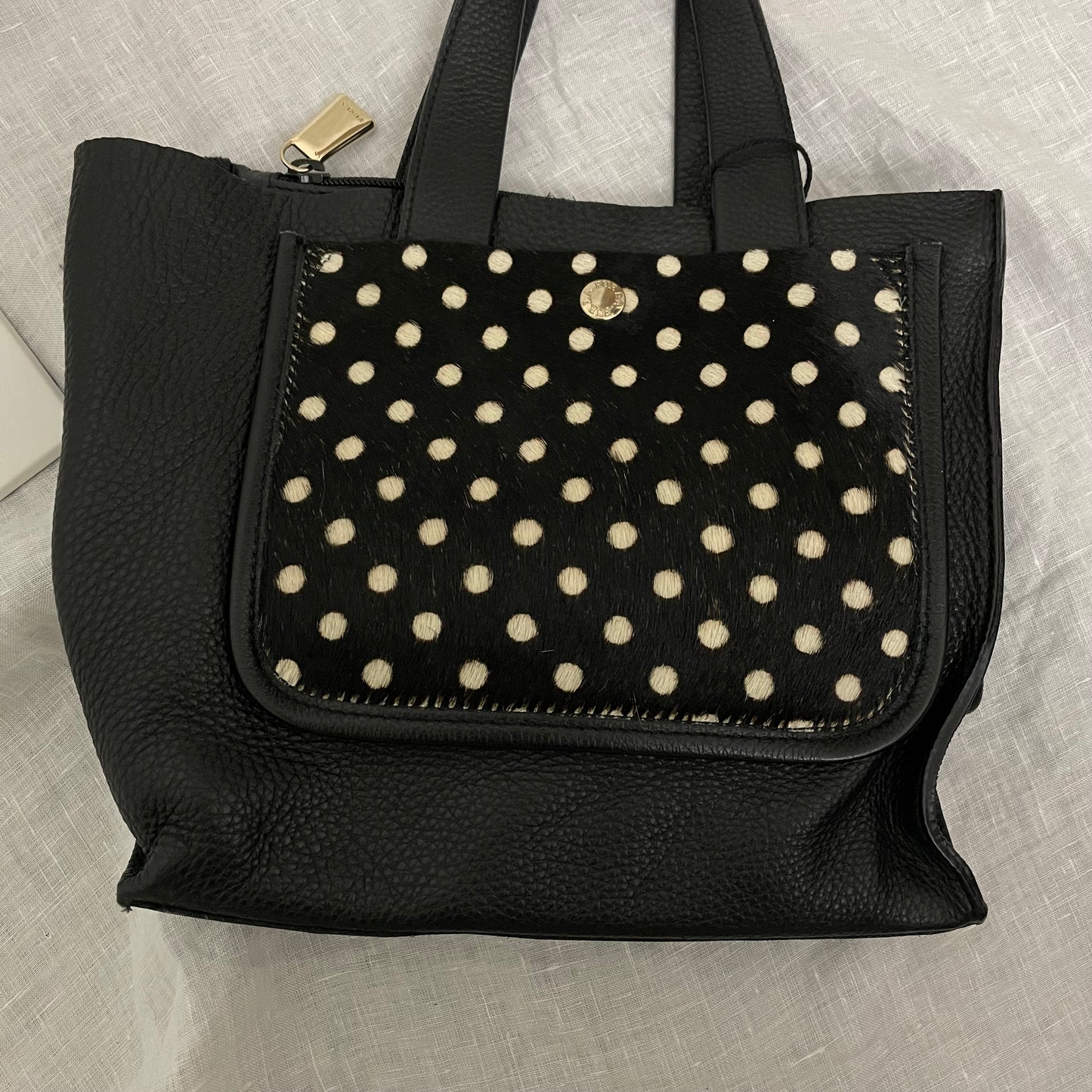 preppy furla black leather mini bag with pony hair polka dot print patch