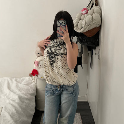 axes femmes cream polka dot ruffle collar blouson vest top