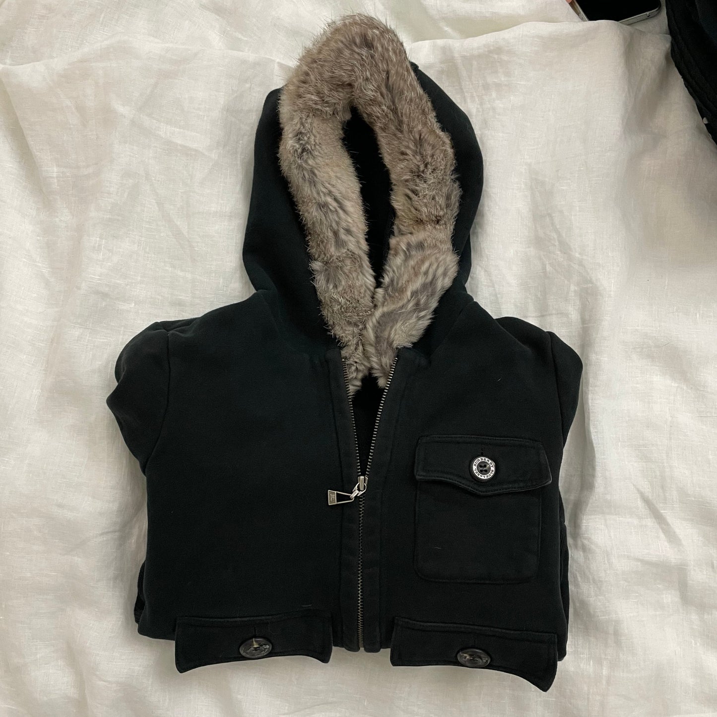 burberry blue label black zip jacket with multi pocket detail and rabbit fur hood trim