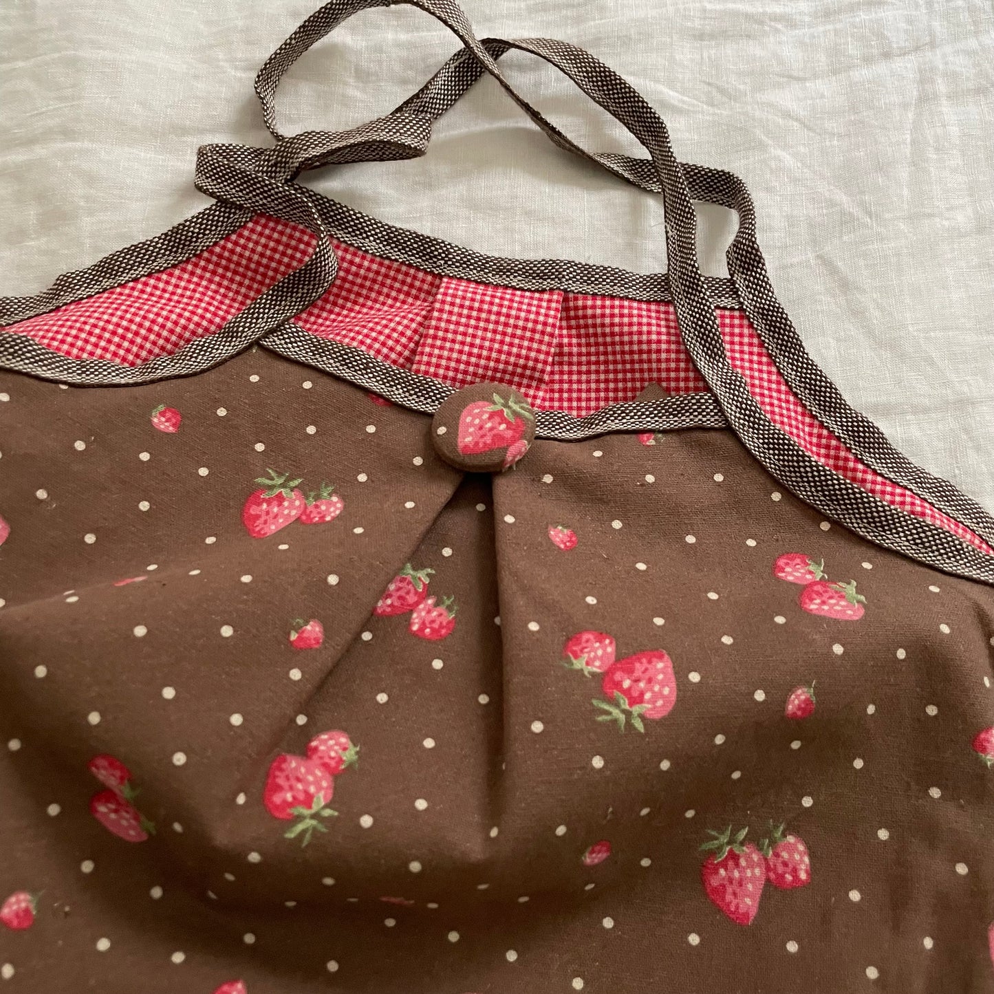 chocolate brown strawberry print granny tote bag with cute strawberry button