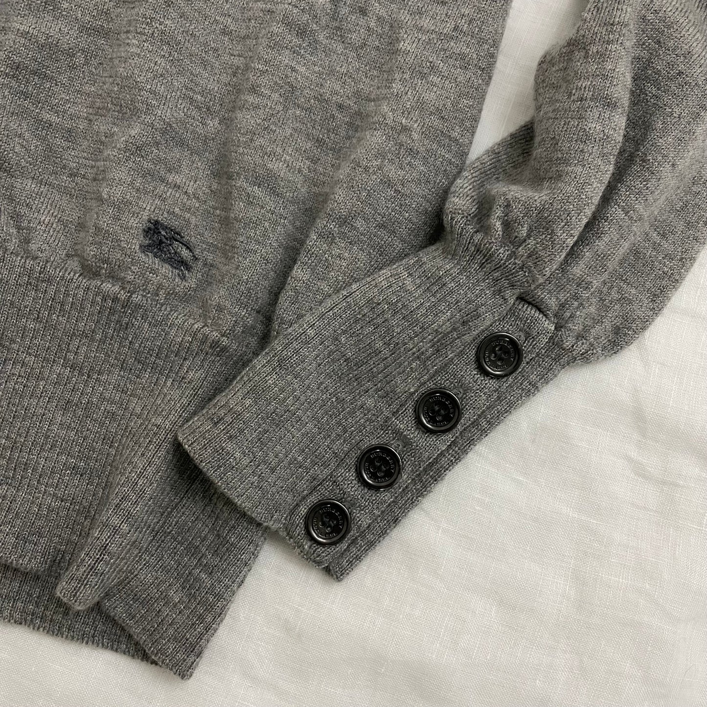 burberry blue label grey ribbed hem v neck sweater with large button detail on the sleeves