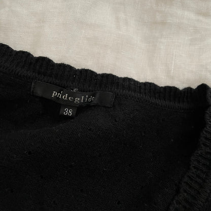 prideglide black cardigan with pink velor contrast bow charms