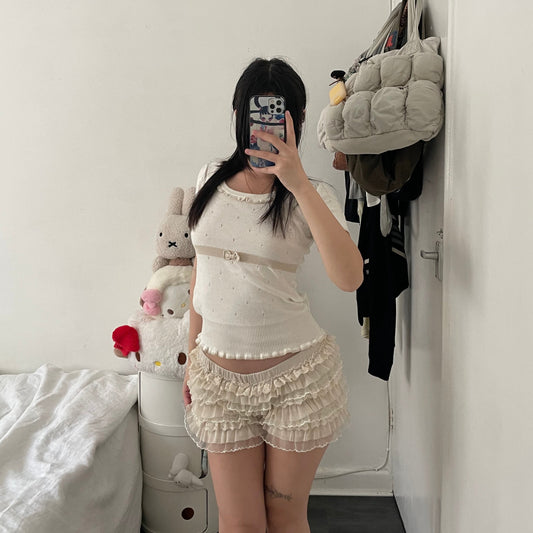 cynthia rowley white beige short sleeve frill hem knit top