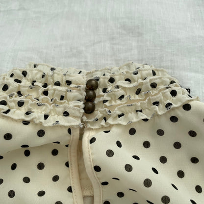 axes femmes cream polka dot ruffle collar blouson vest top