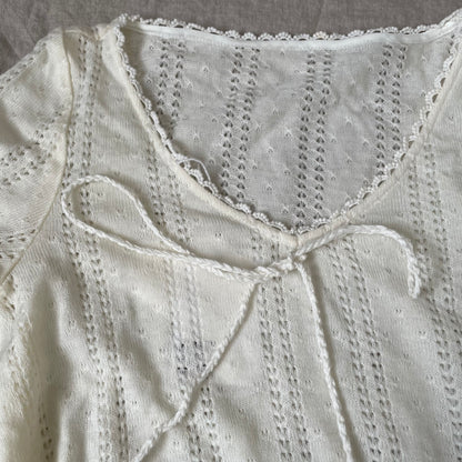 vintage dressiene pointelle flared arm lightweight knit top with pom poms