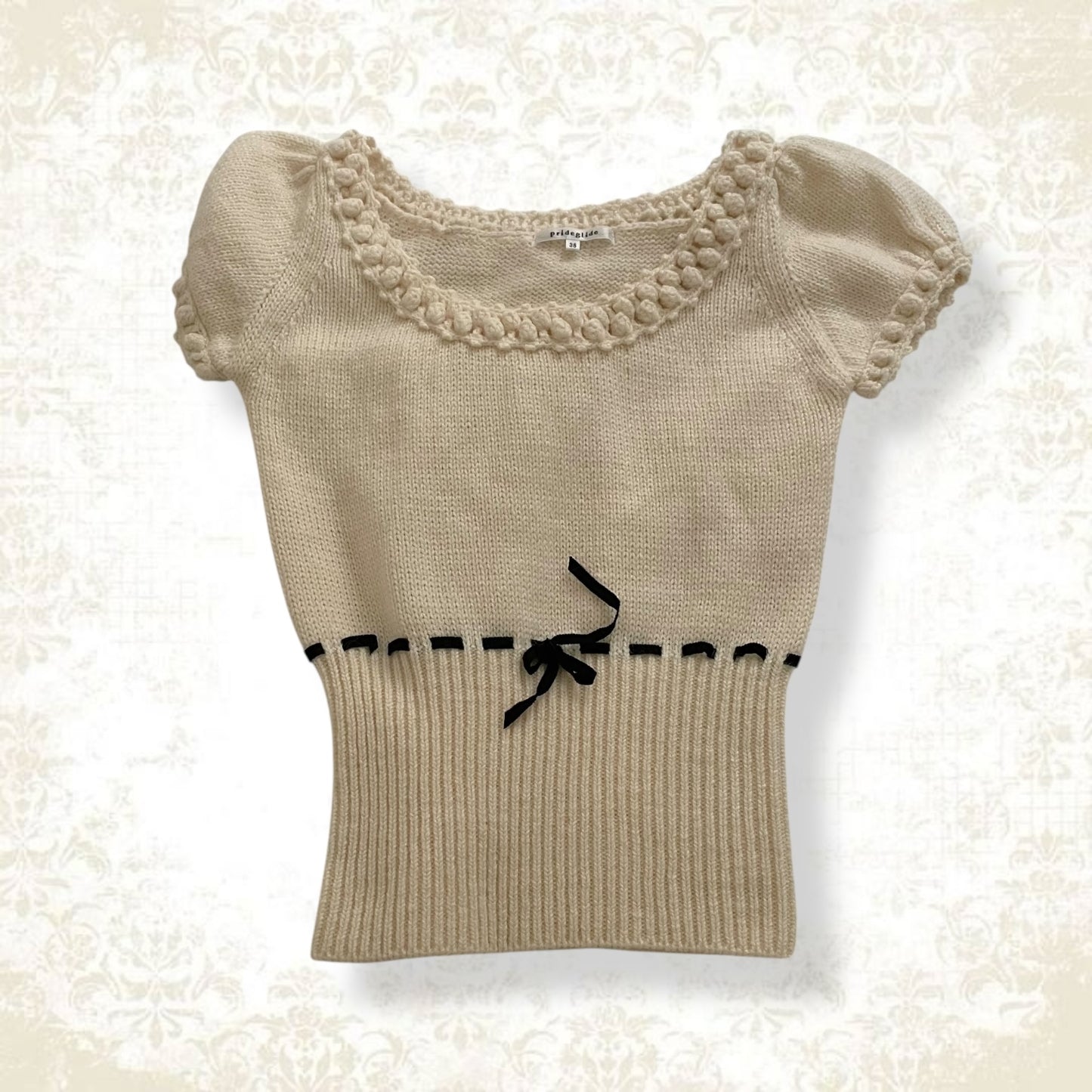 prideglide cream puff sleeve mohair blend knit top with black ribbon waist detail